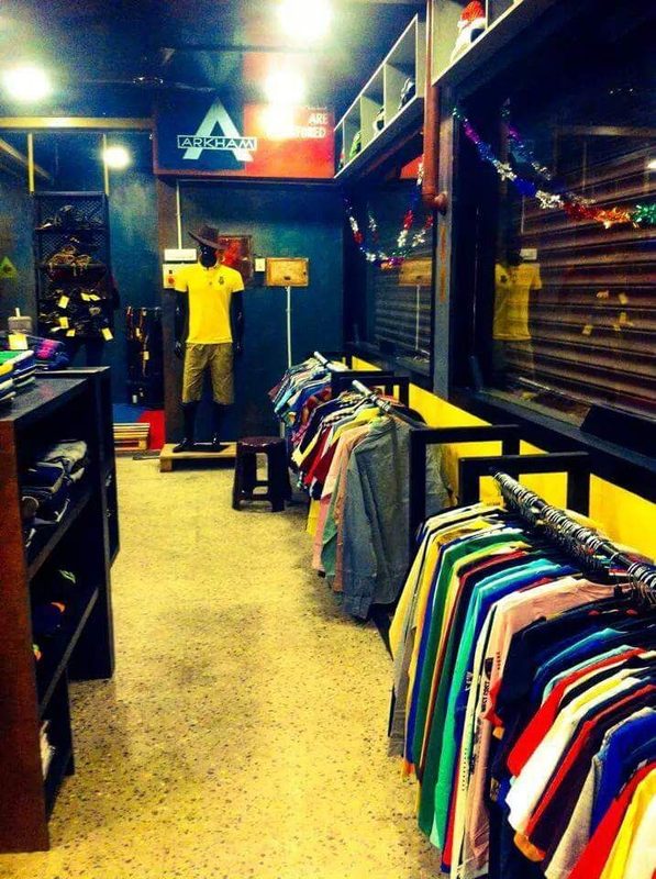 Garment showroom interior with wall display racks in Coimbatore